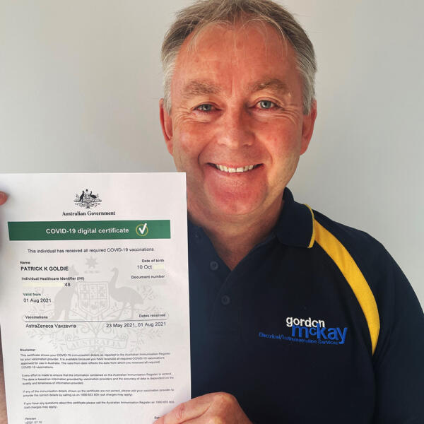 Gordon McKay team member Pat Goldie with his COVID jab certificate